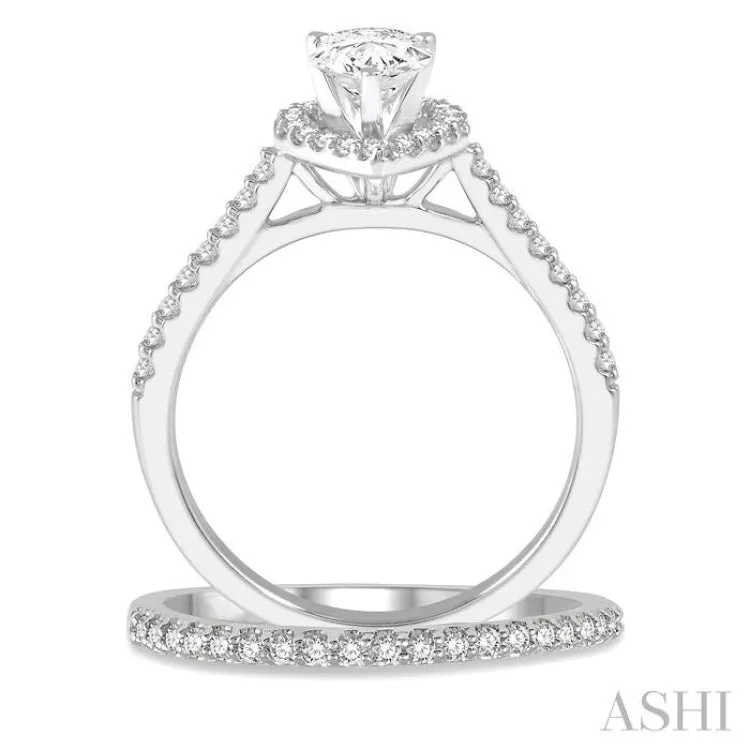 1 1/4 ctw Round Cut Diamond Wedding Set With 1 1/10 ctw Pear Cut 3/4 ctw Center Stone Engagement Ring and 1/5 ctw Wedding Band in 14K White Gold