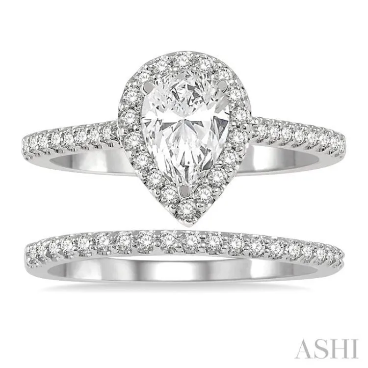 1 1/4 ctw Round Cut Diamond Wedding Set With 1 1/10 ctw Pear Cut 3/4 ctw Center Stone Engagement Ring and 1/5 ctw Wedding Band in 14K White Gold