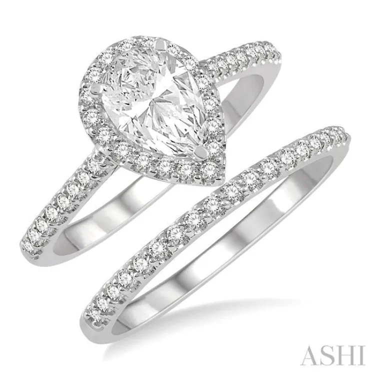 1 1/4 ctw Round Cut Diamond Wedding Set With 1 1/10 ctw Pear Cut 3/4 ctw Center Stone Engagement Ring and 1/5 ctw Wedding Band in 14K White Gold