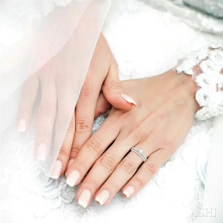 1 Ctw Diamond Wedding Set with 3/4 Ctw Round Cut Engagement Ring and 1/3 Ctw Wedding Band in 14K White Gold